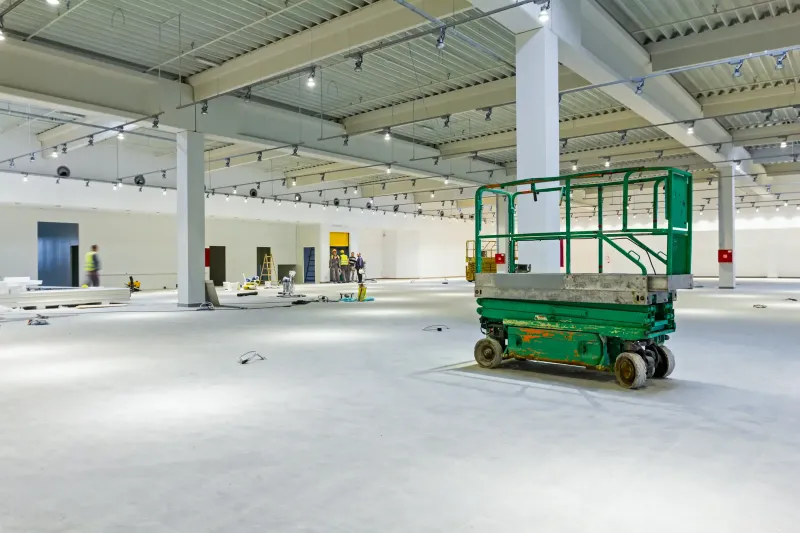 Commercial make good team working in large Melbourne warehouse space