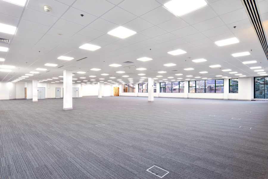 Commercial office ceiling tiles and LED panels reinstated as part of an office make good in Melbourne